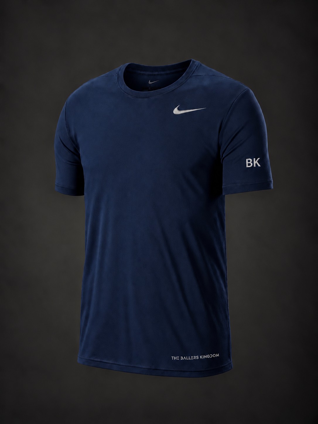 Performance tee with a small Ballers Kingdom wordmark at the lower-right hem, BK sleeve initials and Nike swoosh