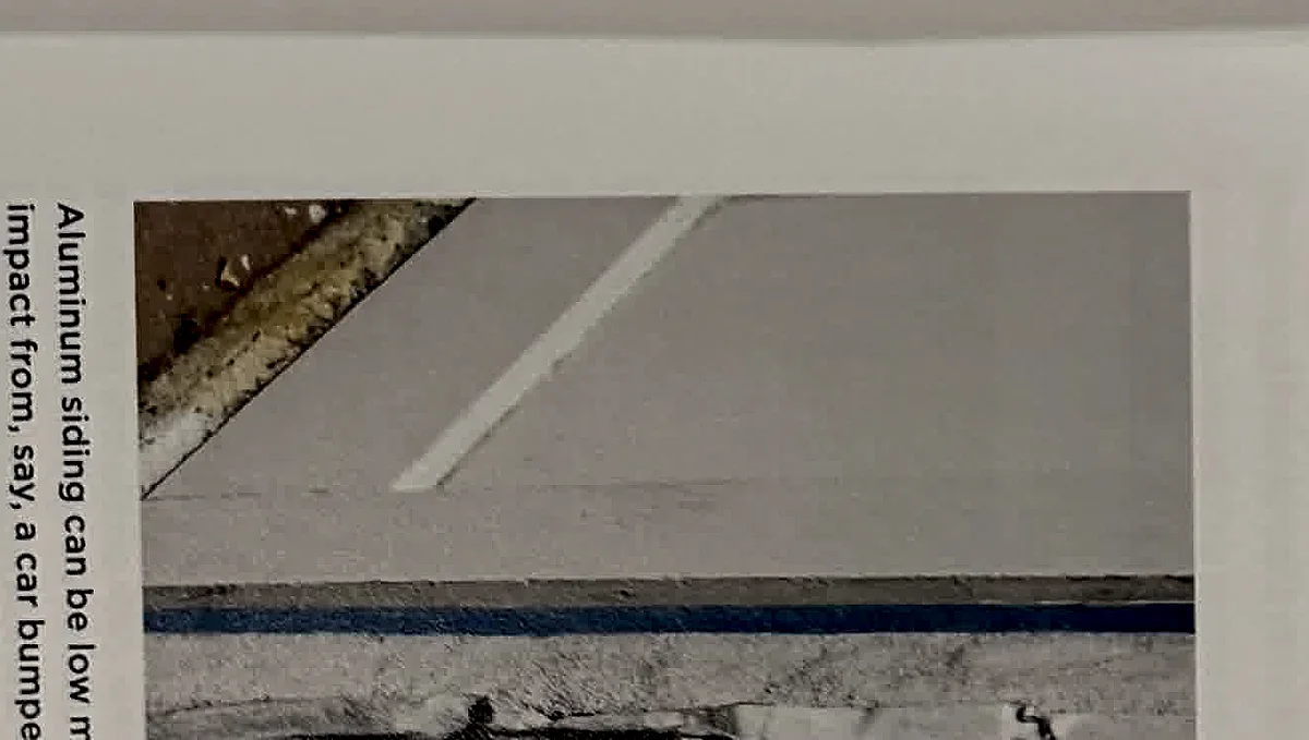 A cropped textbook photo of exterior trim or wall joint conditions.