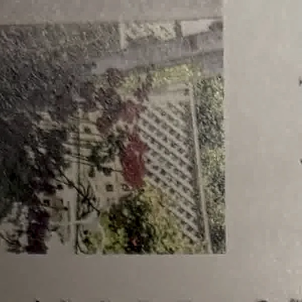 A cropped textbook photo showing deck or railing components.