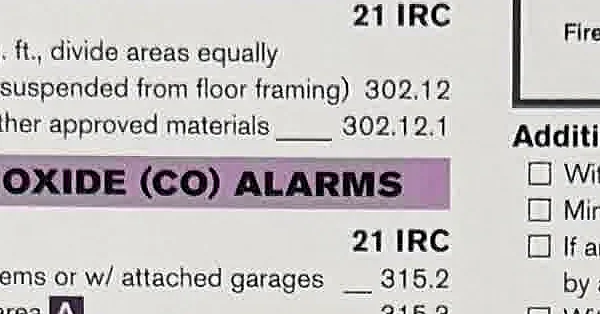 A cropped Code Check-style reference for carbon monoxide alarm requirements.